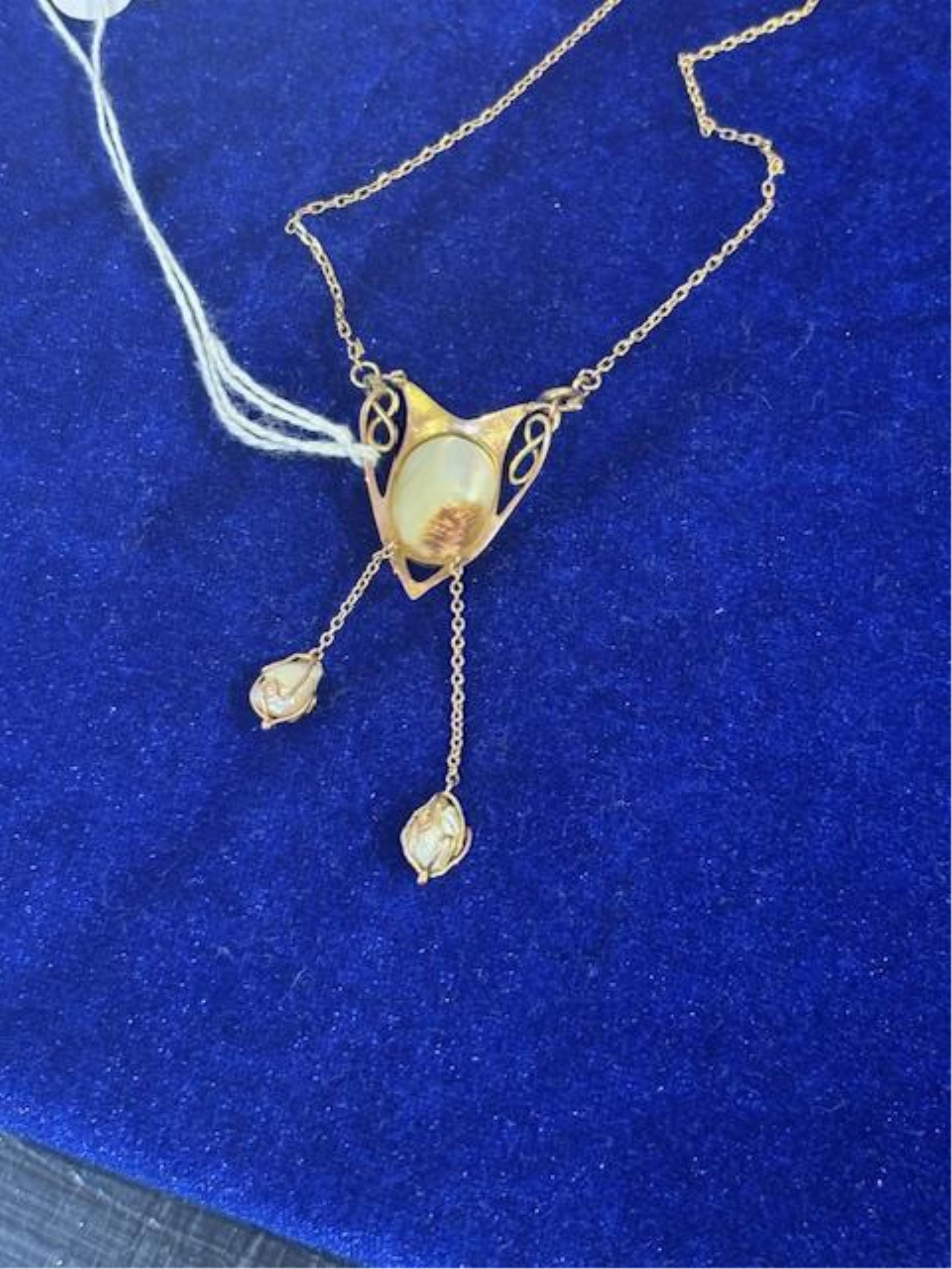 An Art Nouveau 9ct gold, mother of pearl and baroque pearl drop set pendant necklace